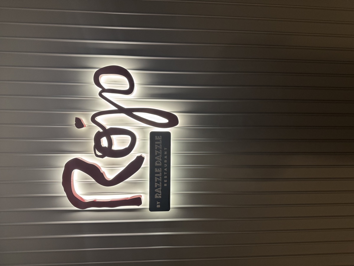 Rojo by Razzle Dazzle restaurant signage on Brilliant Lady
