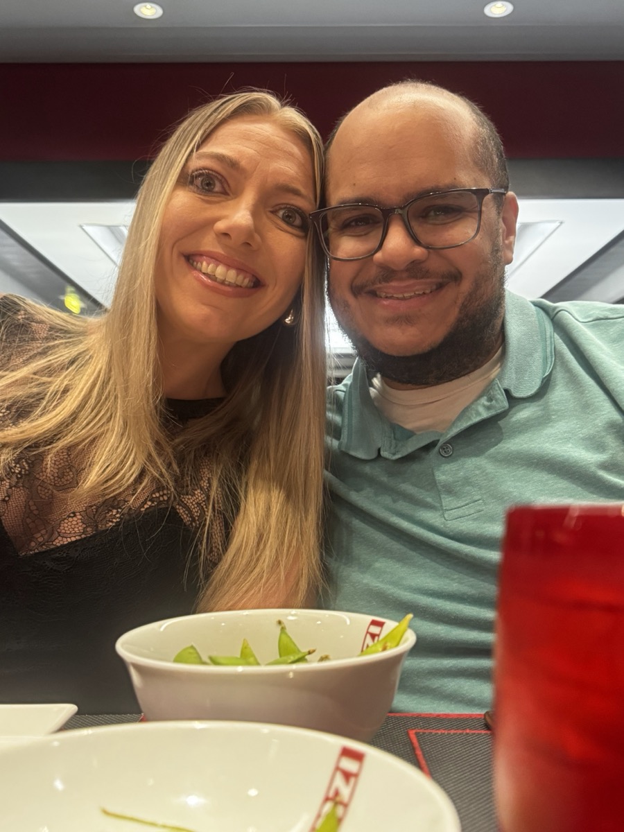 Ashley and Miguel selfie at Izumi, bowl of edamame on the table