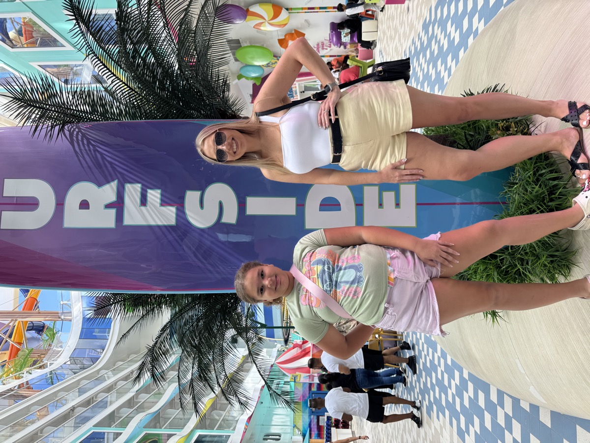 Ashley and Abigail at the Surfside neighborhood signage on Icon
