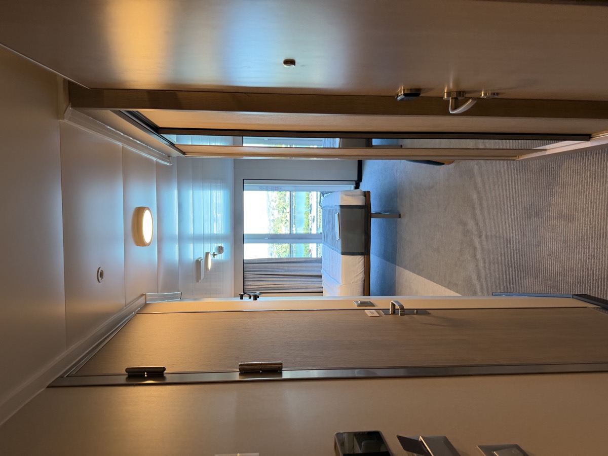 Cabin interior on Norwegian Luna, large window with daylight