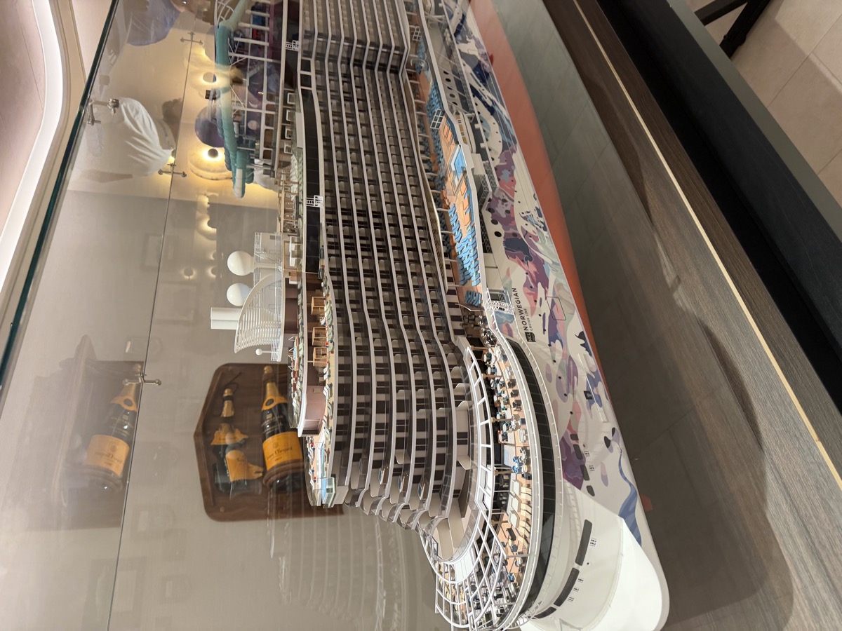 Norwegian Luna scale model on display behind glass