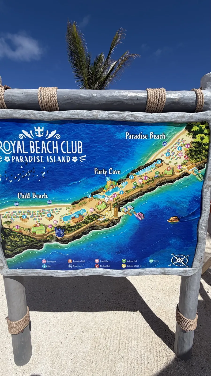 Map sign of Royal Beach Club Paradise Island showing Chill Beach, Party Cove and Paradise Beach