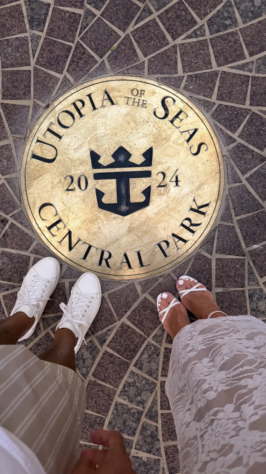 Utopia of the Seas Central Park 2024 medallion set into the walkway