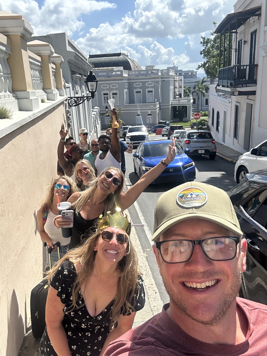 Group selfie walking through the colorful streets of Old San Juan